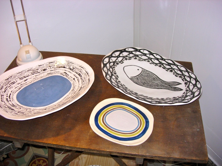 Pair of platters and small plate